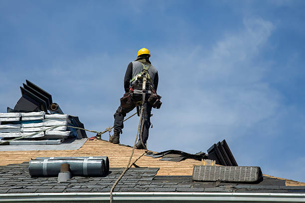 Professional Roofing technician working in Manchester, IA